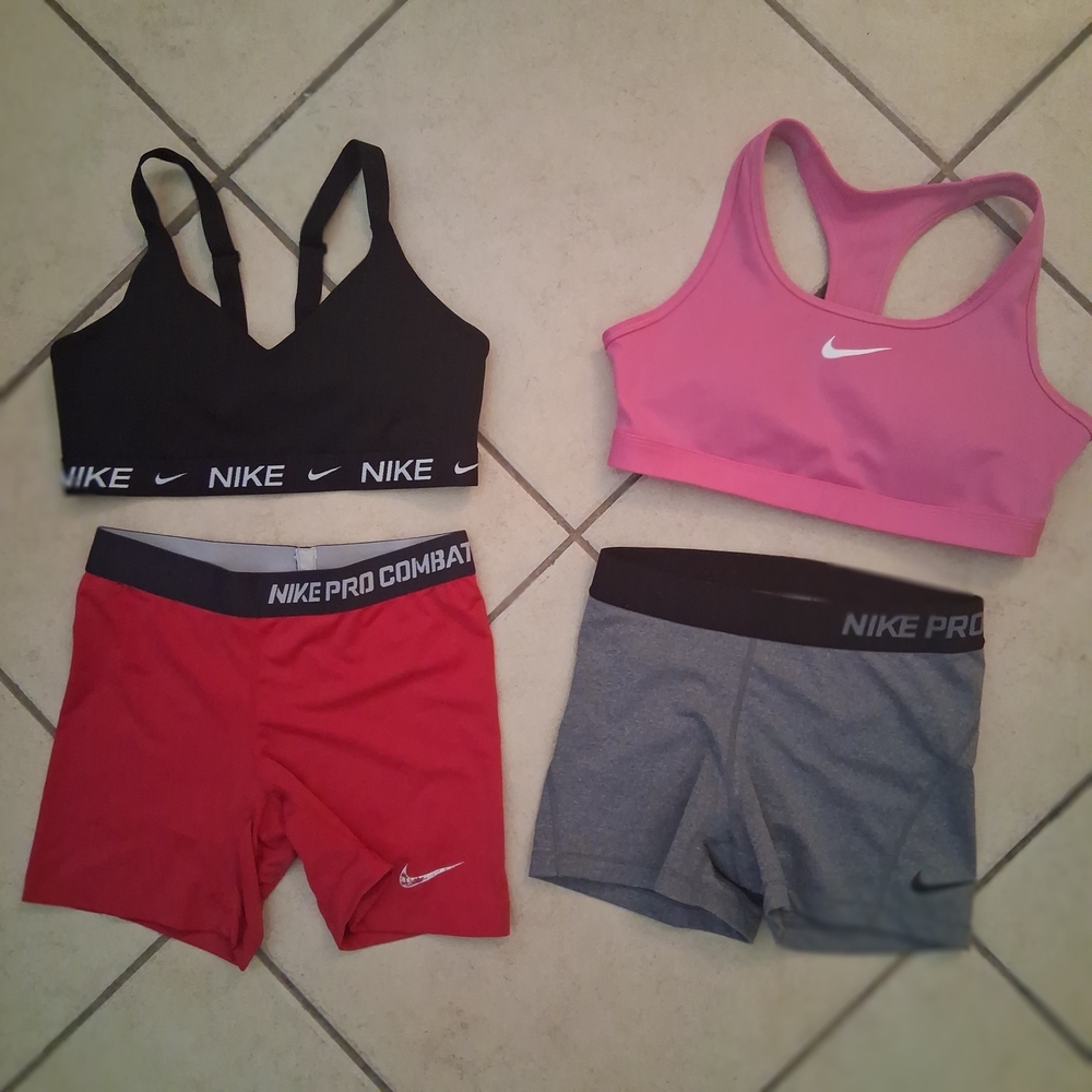 2 Nike Sports Bra and 2 Pair NIKE Pro Shorts. Medium No Fading Wear Or Holes..